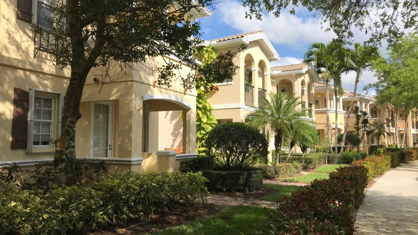 Looking down the row of townhouses in Florida on a beautiful Spring day.