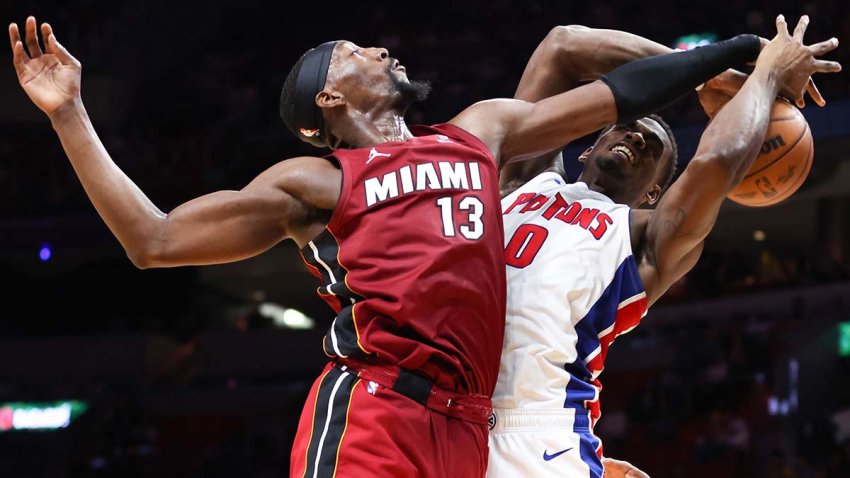 MIAMI, FLORIDA – MARCH 19: Bam Adebayo #13 of the Miami Heat and Jalen Duren #0 of the Detroit Pistons battle for the ball during the second quarter of the game at Kaseya Center on March 19, 2025 in Miami, Florida. NOTE TO USER: User expressly acknowledges and agrees that, by downloading and or using this photograph, User is consenting to the terms and conditions of the Getty Images License Agreement. (Photo by Megan Briggs/Getty Images)