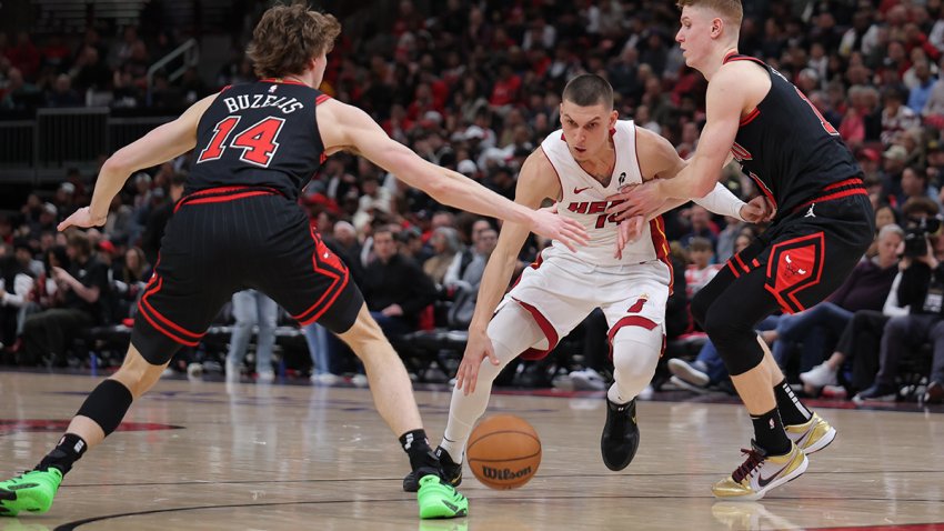 CHICAGO, IL – APRIL 16: Kevin Huerter #13 of the Chicago Bulls plays defense against Tyler Herro #14 of the Miami Heat during the first half of the 2025 SoFi Play-In Tournament on April 16, 2025 at the United Center in Chicago, Illinois. (Photo by Melissa Tamez/Icon Sportswire via Getty Images)