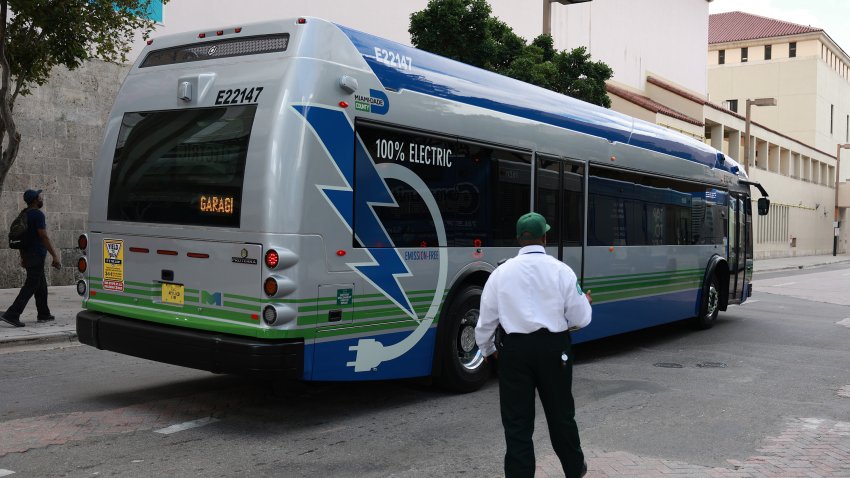 MIAMI, FLORIDA – FEBRUARY 02: A 40-foot, battery-powered electric bus drives along a street on February 02, 2023 in Miami, Florida. Miami-Dade County announced today that its transit system has begun using 75 Proterra ZX5 battery-electric buses. The new fleet is both advancing the county’s climate action strategy by reducing emissions and creating cost savings for transit riders and residents alike. (Photo by Joe Raedle/Getty Images)